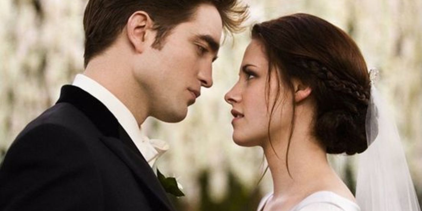 Robert Pattinson and Kristen Stewart as Edward and Bella looking at each other on their wedding day in Twilight: Breaking Dawn