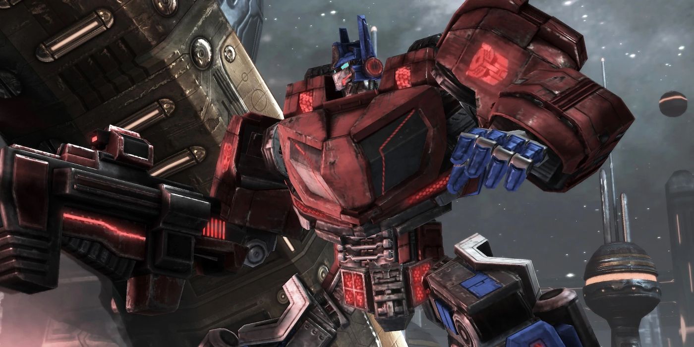 Optimus Prime firing a gun in the Transformers video game War for Cybertron.