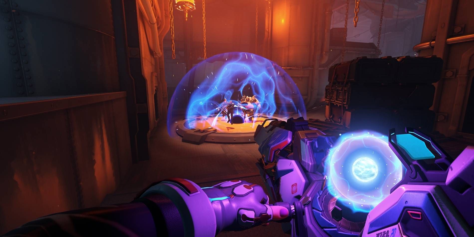 Overwatch 2 Zarya Graviton Surge Ultimate Ability Being Used on London Map Against Enemy Orisa and Other Foe Player Perspective Screenshot