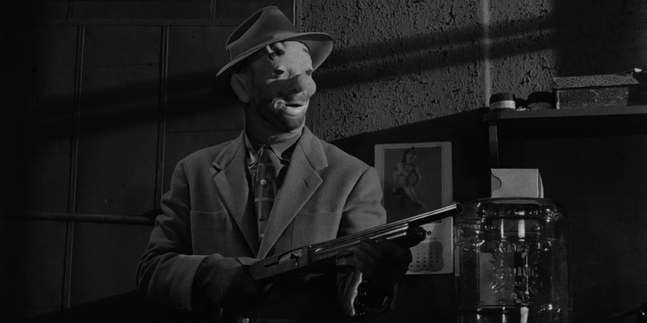 A_masked_bandit_with_a_shotgun_in_Stanley_Kubrick's_The_Killing