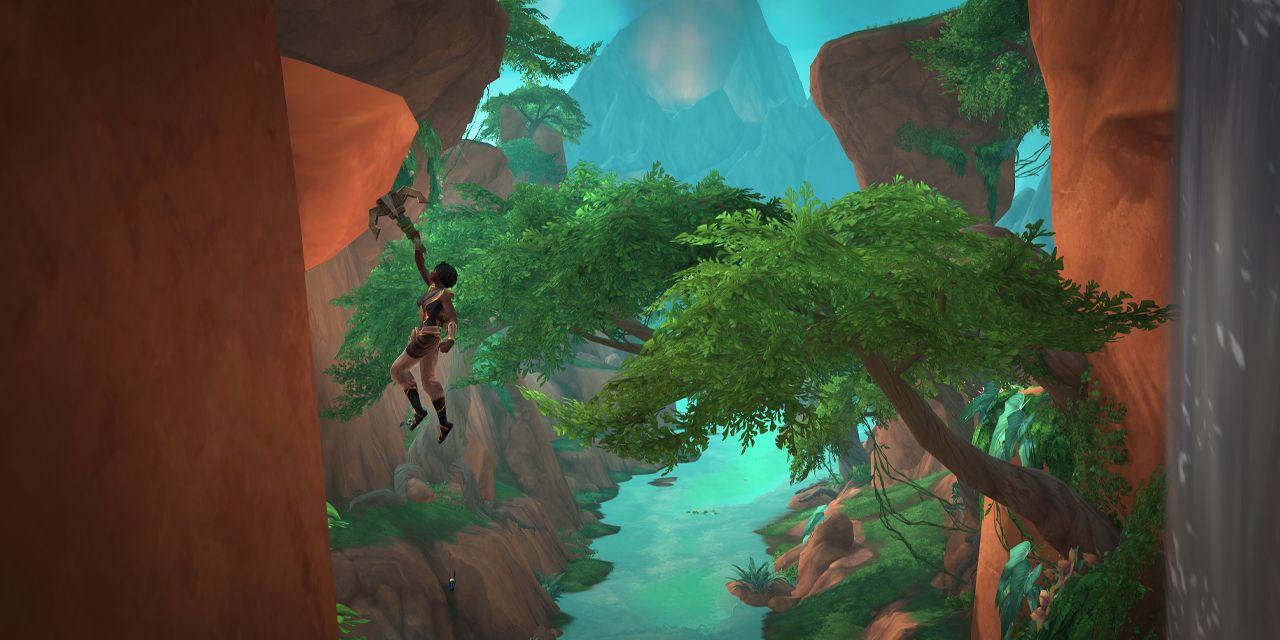 an explorer of the dragonscale expedition hangs from a cliff
