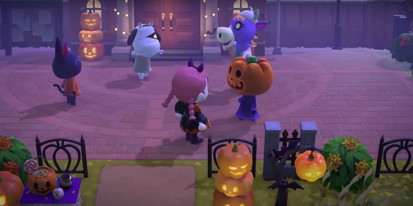 Animal Crossing player character and a few villagers in Halloween costumes, surrounded by spooky decorations