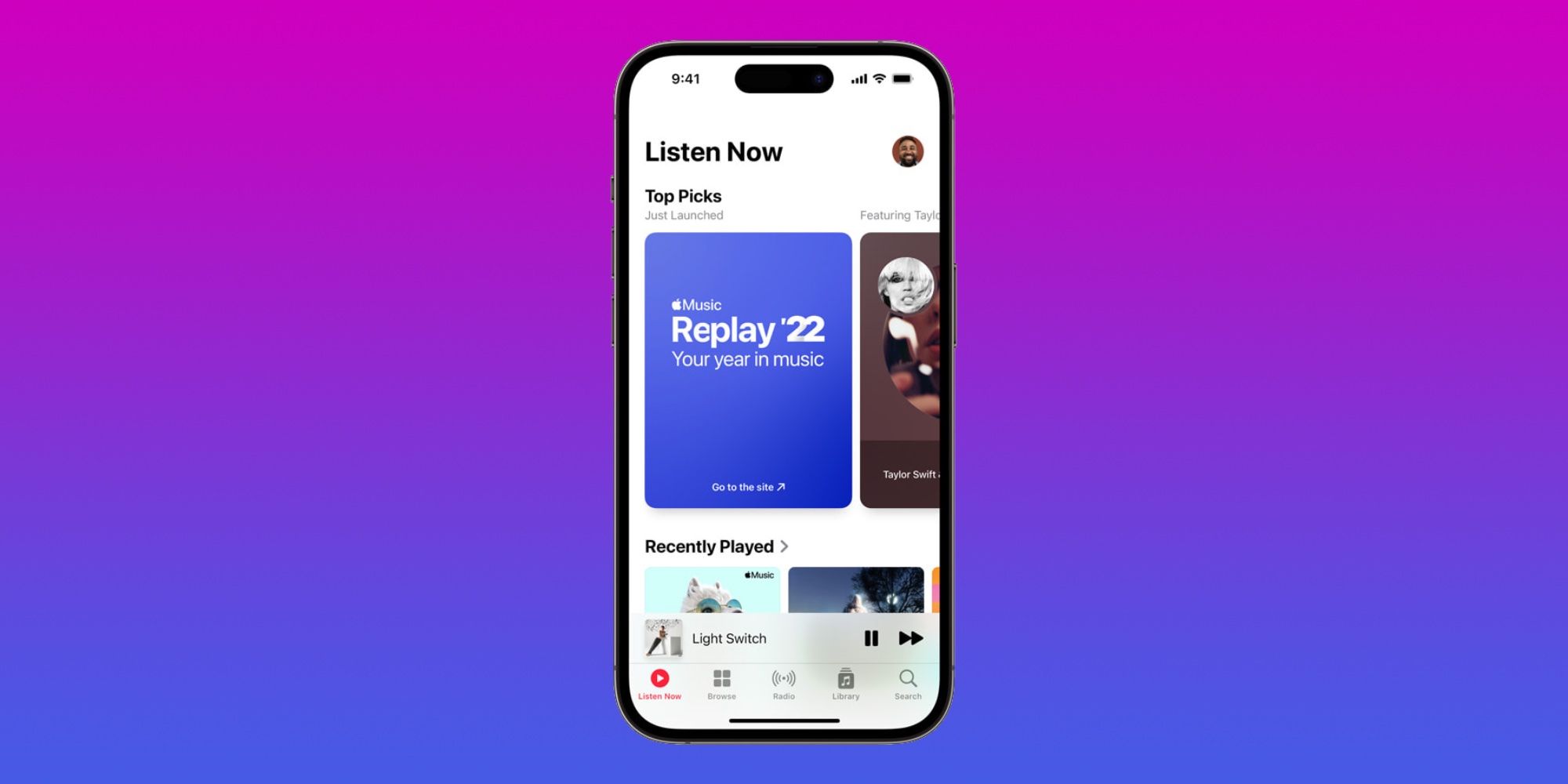 The Apple Music app on iPhone 14 Pro showing a Replay '22 playlist card.
