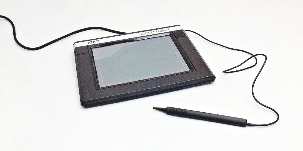An Atari CX77 Touch Tablet is displayed