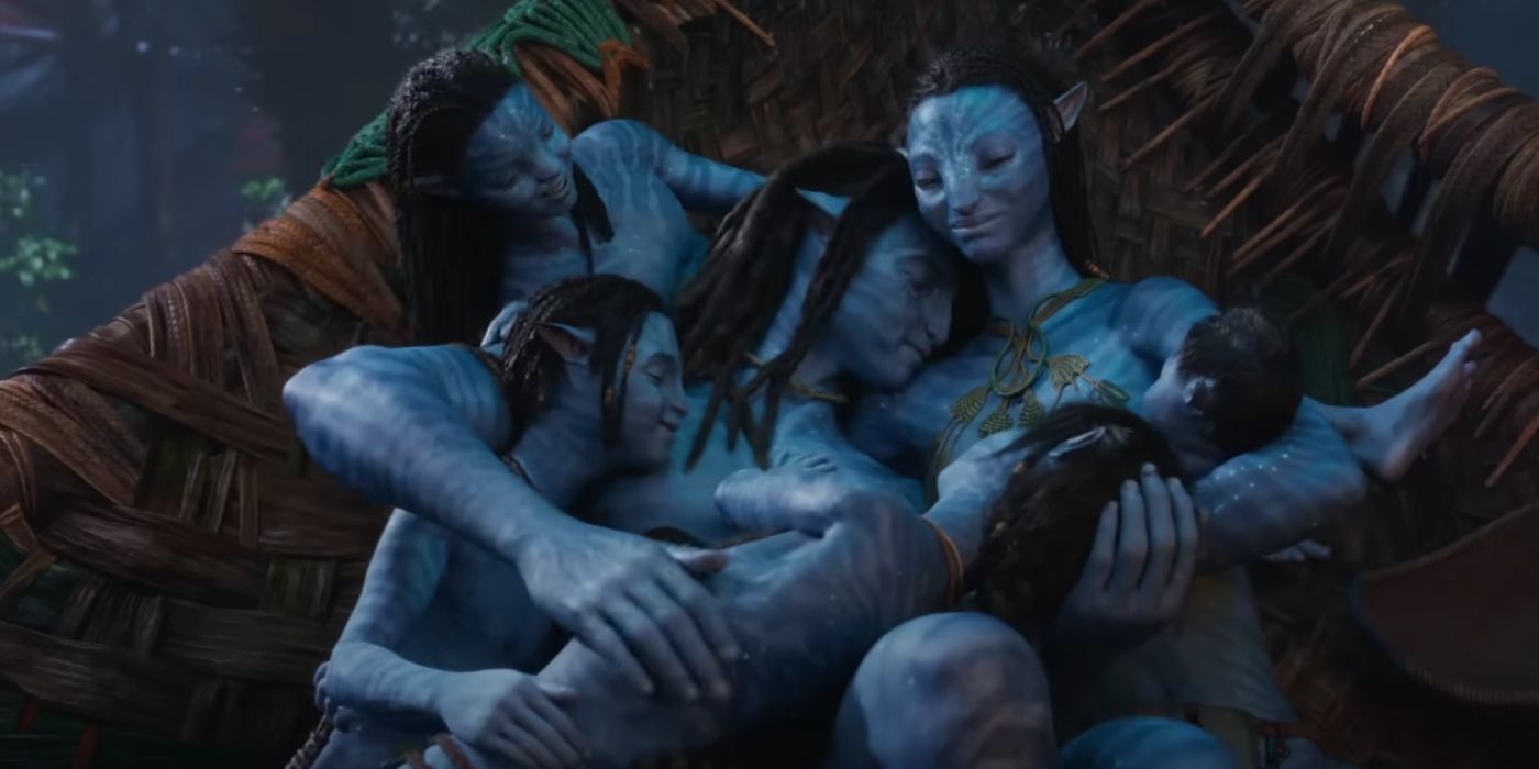 Jake and Neytiri cuddle with their children in Avatar: The Way of Water.