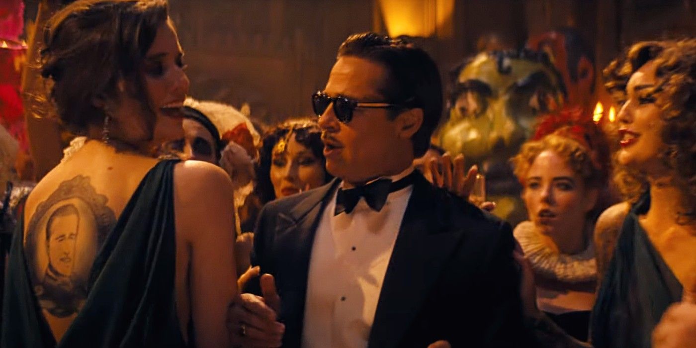 Brad Pitt na Babilônia em uma festa vestido de smoking e rodeado de mulheres