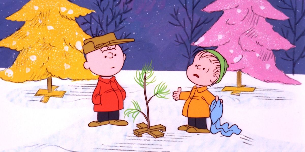 A image of Charlie Brown and LInus choosing an Xmas tree is shown.