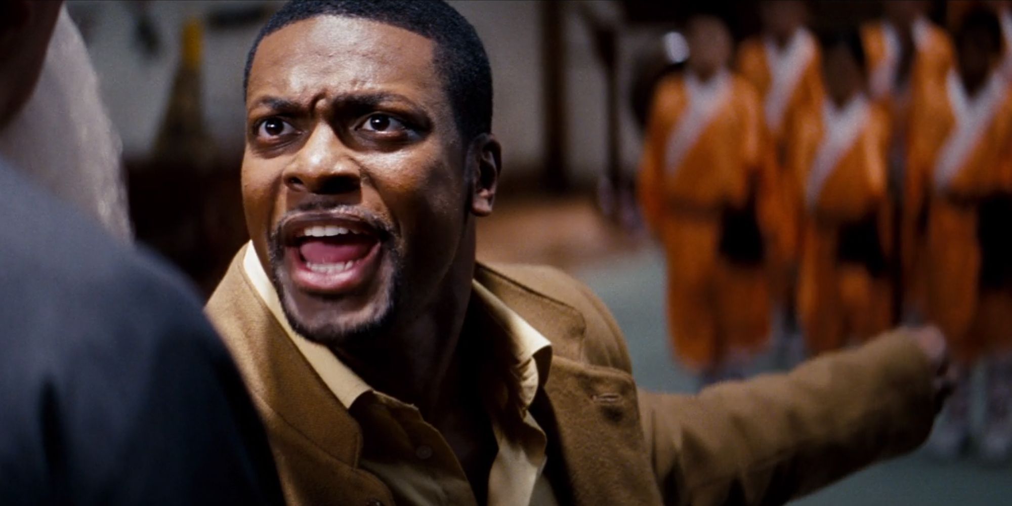 Carter shouting at the martial arts academy master in Rush Hour 3