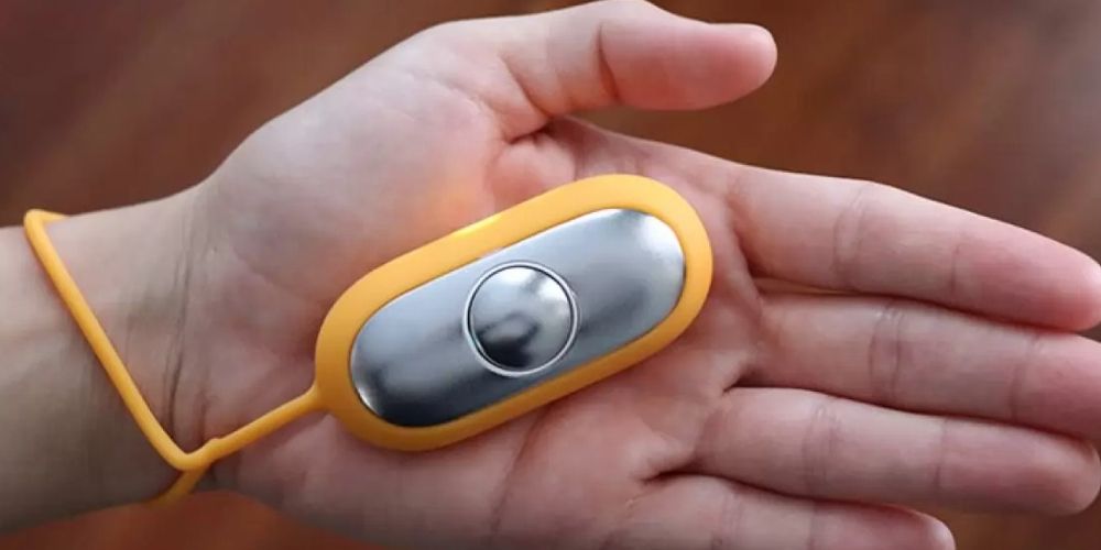 A Chill Pill device is seen in a person's hand