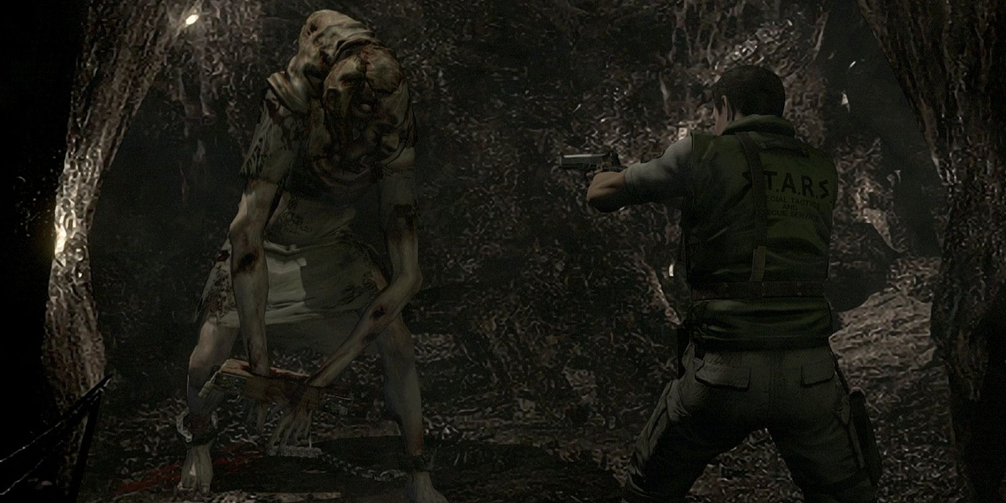 Chris Redfield fighting Lisa Trevor in Resident Evil remake (2002)
