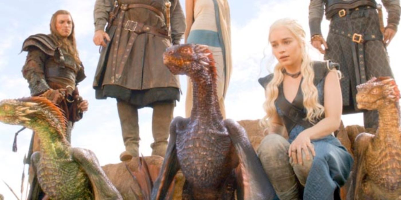 Daenerys cercada por seus três dragões