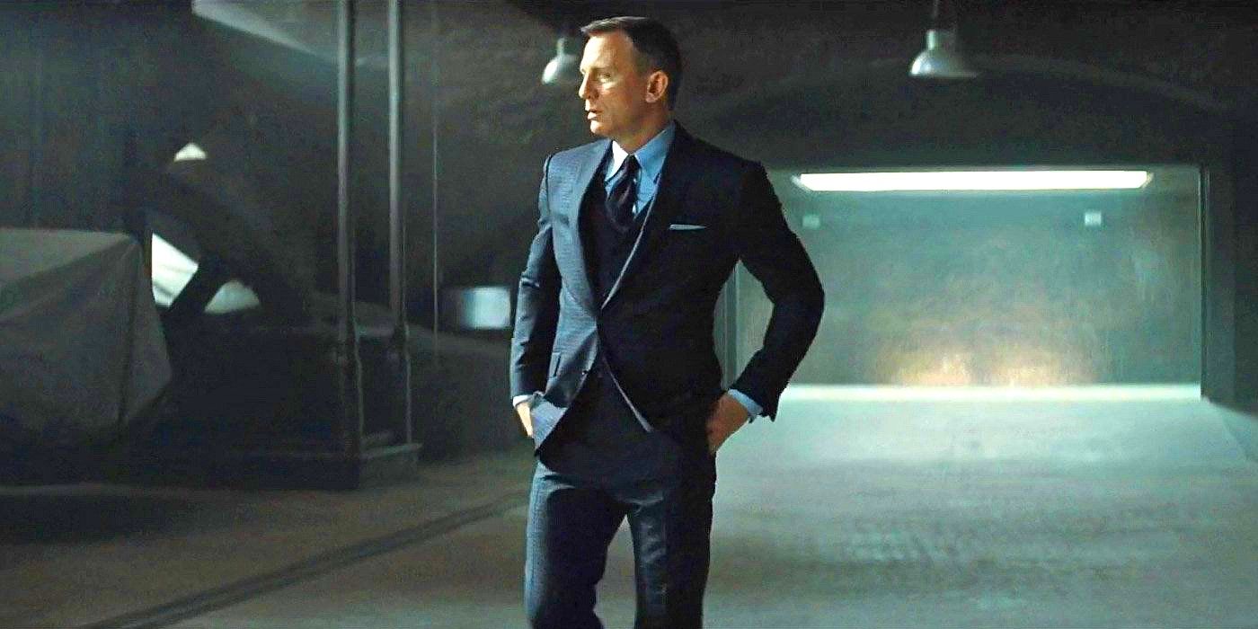 Daniel Craig as James Bond looking around in the garage in Spectre