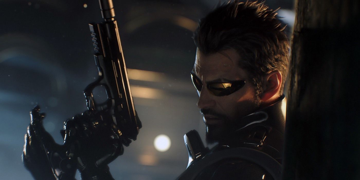 Adam Jensen, the protagonist of Deus Ex, holding a futuristic handgun 