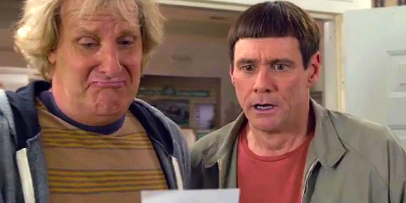 Lloyd and Harry (Jeff Daniels and Jim Carrey) look at a note in Dumb and Dumber Two.