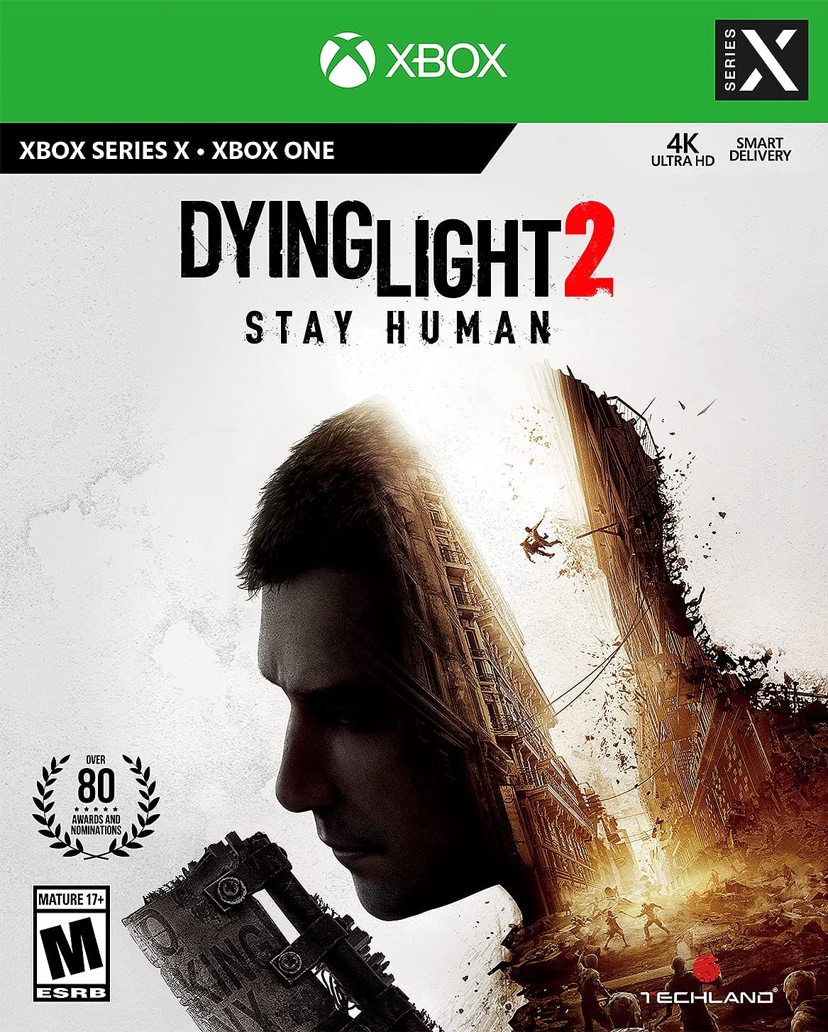 Dying Light 2 cover with a man's head cleaved in two and a figure repelling down one side into a decript cityscape