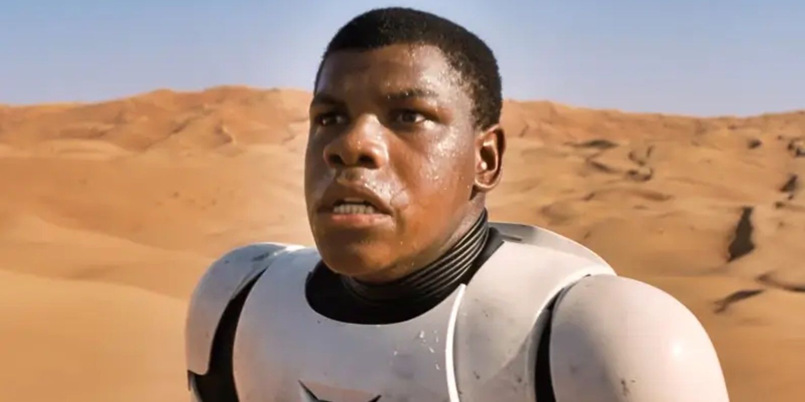 Finn in the Jakku desert.