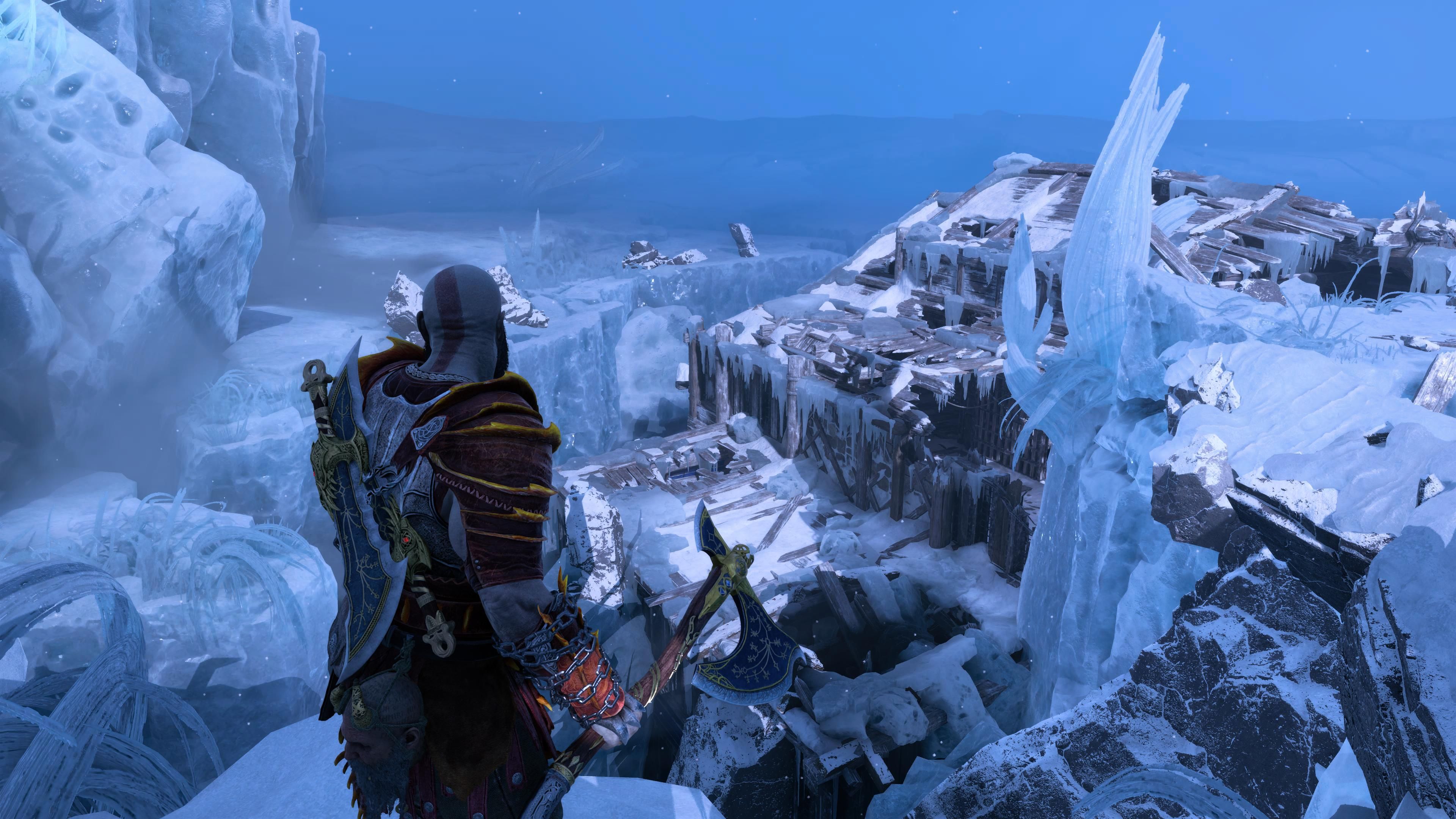 God of War Ragnarök Kratos olhando para os destroços da prisão de Niflheim Aesir