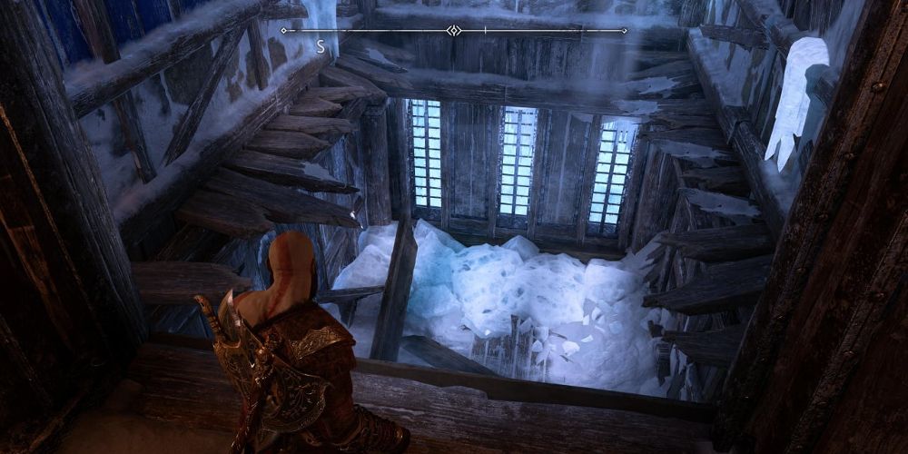 Kratos melihat ke bawah ke penjara di God of War Ragnarok