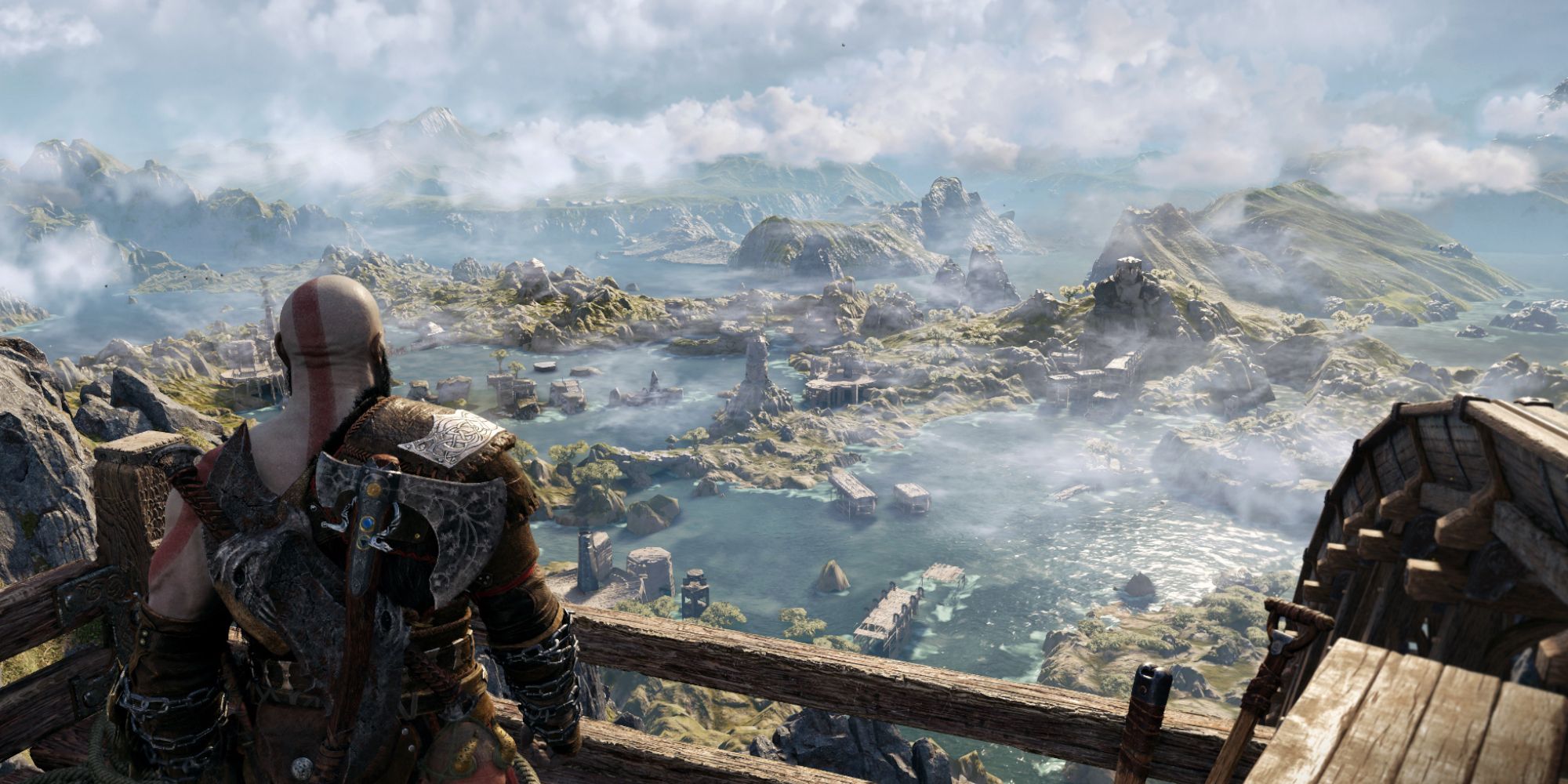 Kratos overlooking a scenic view in God of War Ragnarok