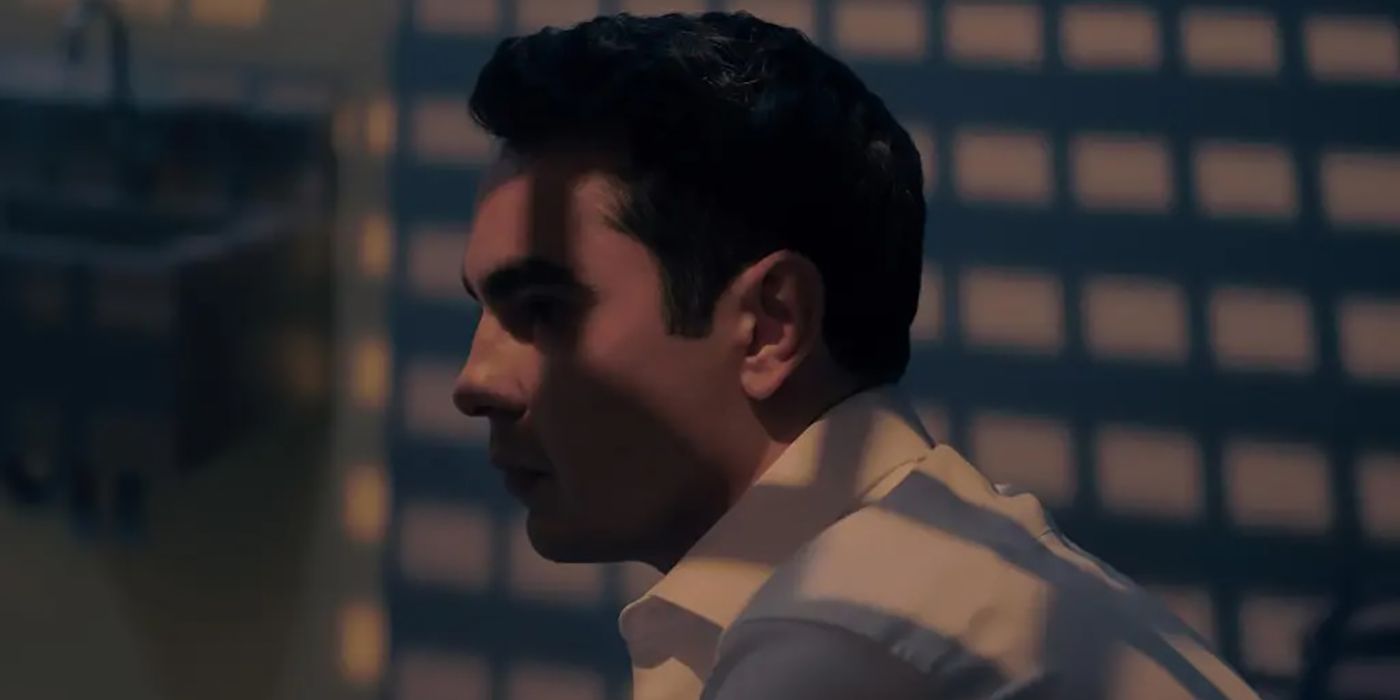 A profile photo of Nick in jail on The Handmaid's Tale, the shadow of the bars over his face