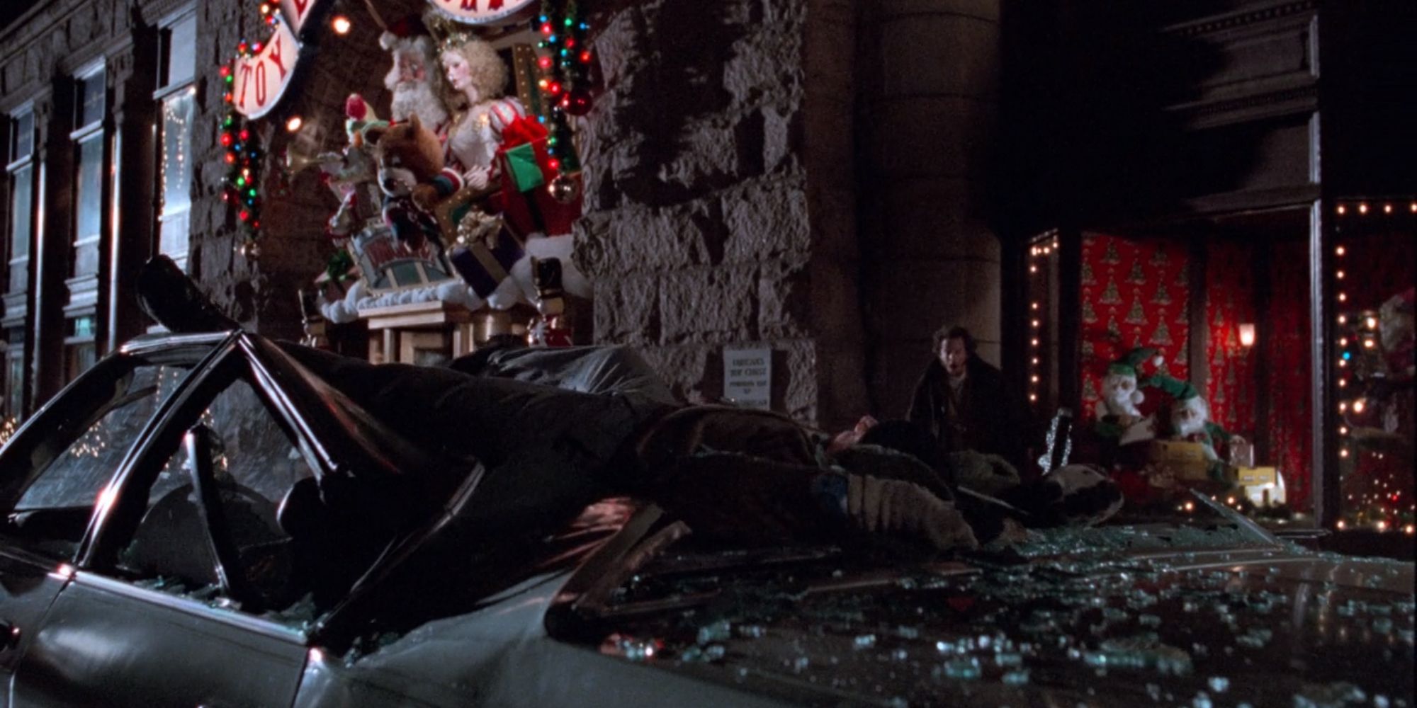 Harry crash landing onto a car in Home Alone 2 Lost In New York (1991)
