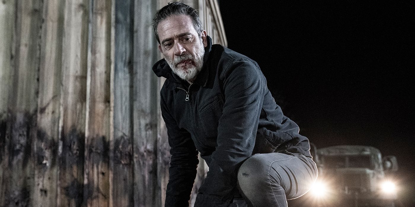 Jeffrey Dean Morgan crouched down in The Walking Dead Season 11