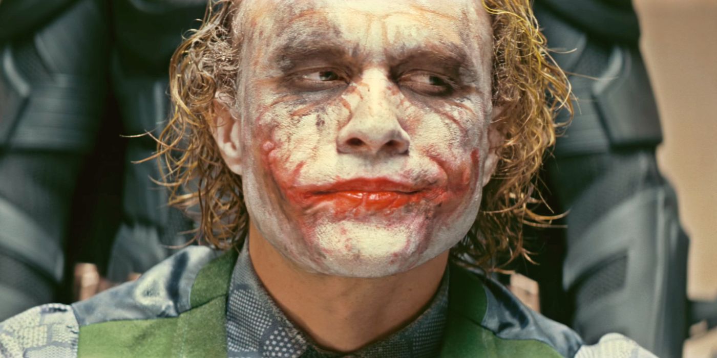 Heath Ledger as the Joker getting interrogated about his crimes in The Dark Knight.