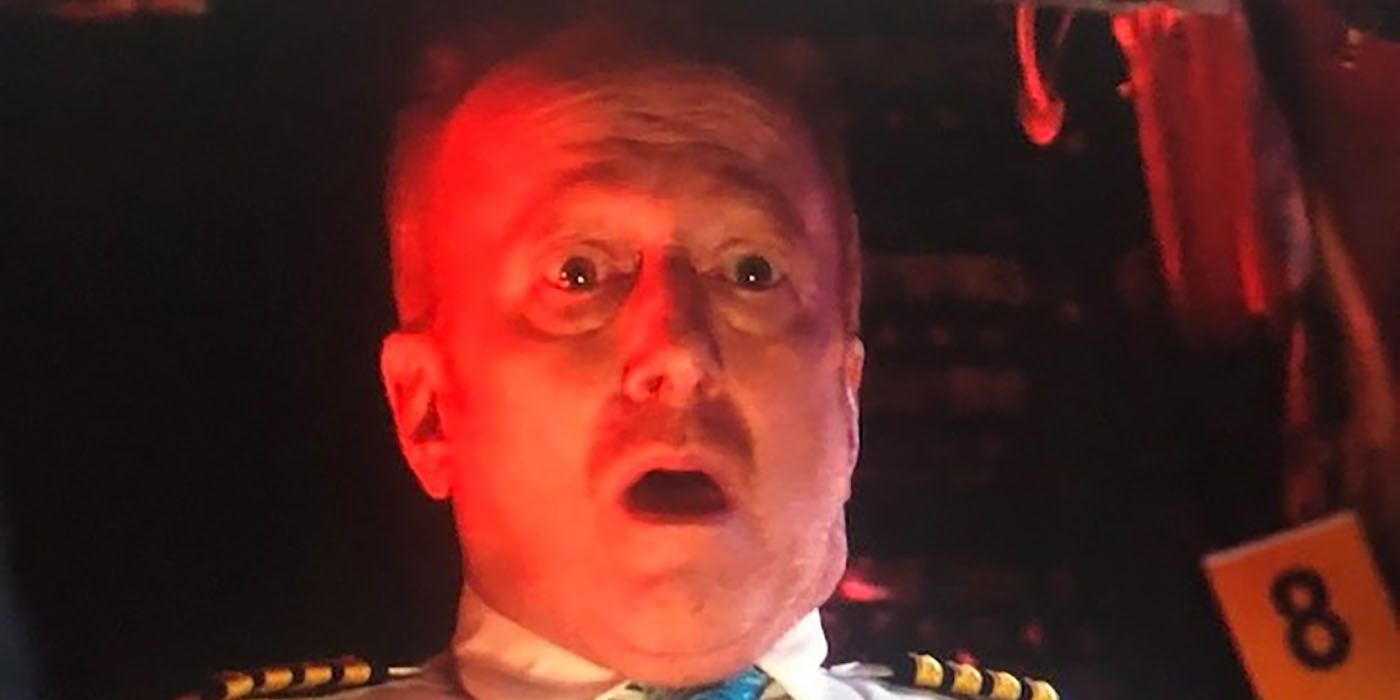Captain Bill Daly, mouth agape looking terrified on Manifest