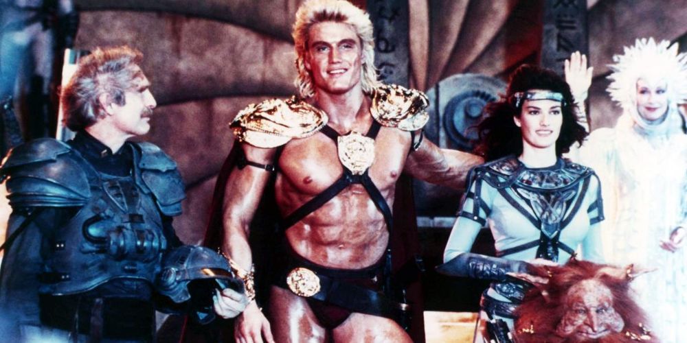 He-Man poses with his actors in Masters of the Universe