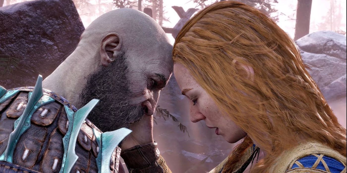 Kratos and Freya resting their heads against each other in god of war ragnarok.