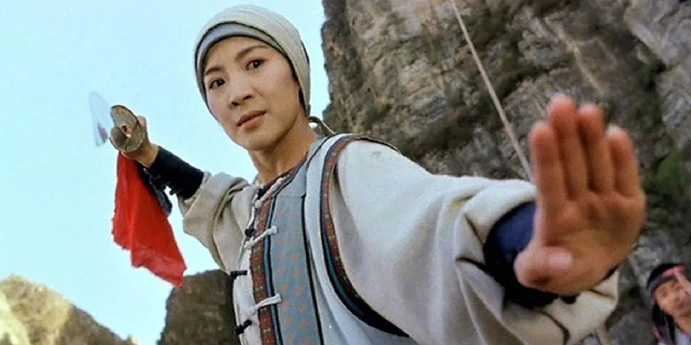 Michelle Yeoh as the title character in Wing Chun strikes a pose with a blade.