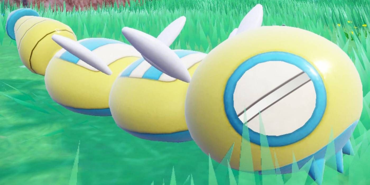 The more common two segment variant of Dudunsparce, a yellow and blue, bulbous snake-like creature from Pokémon Scarlet and Violet.