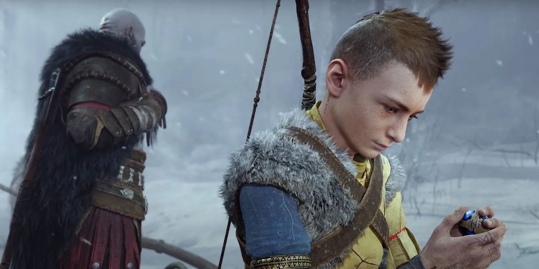 atreus looking at a gem with Kratos behind looking away in god of war ragnarok.