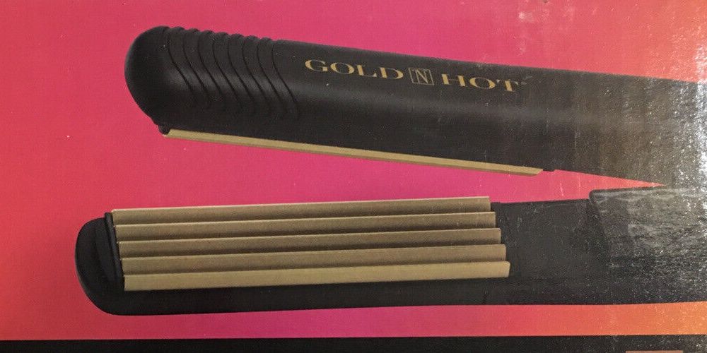 Guld och svart hårkrater från 80-talet