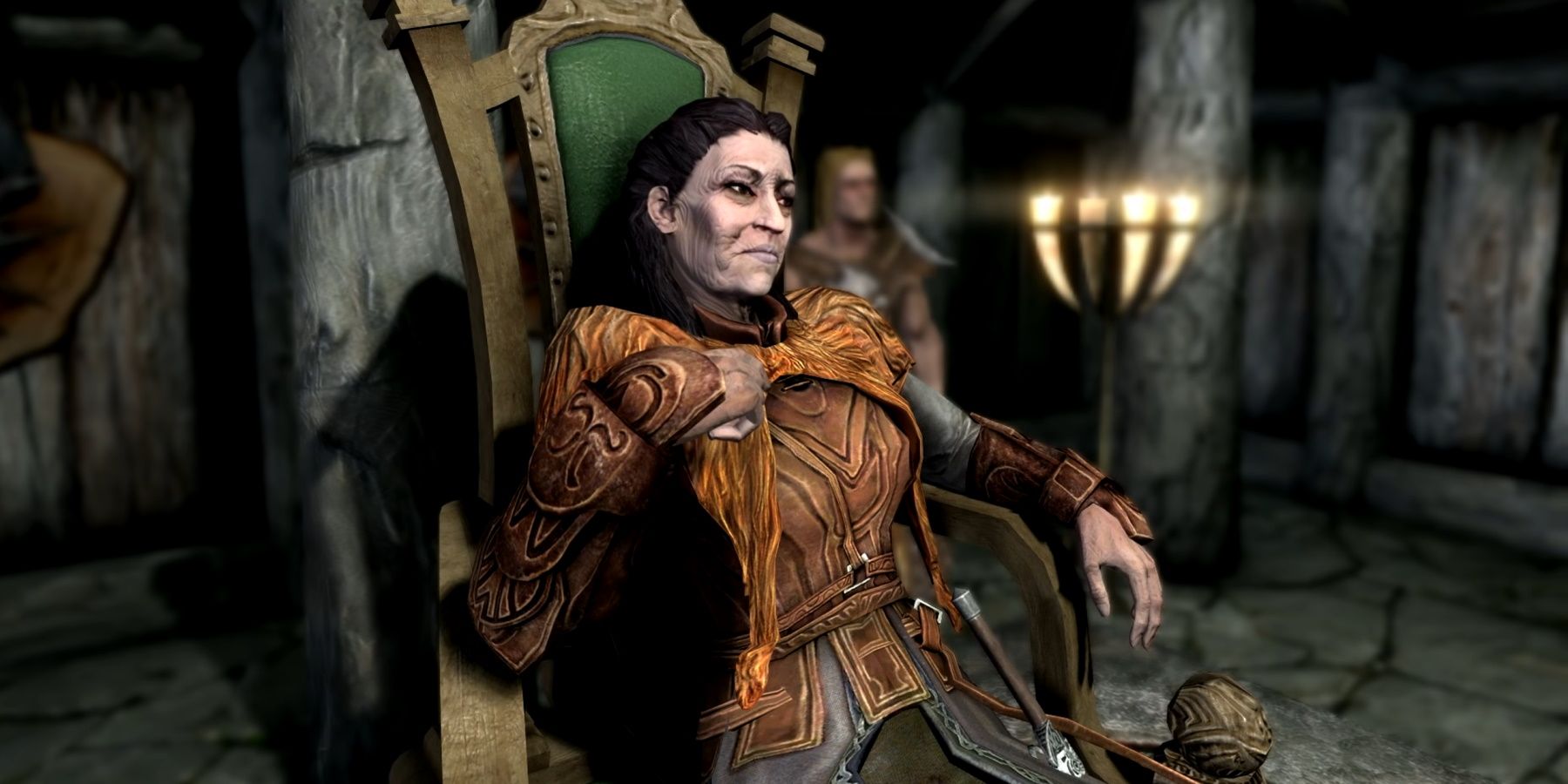 Skyrim's Jarl of Morthal, Idgrod Ravencrone, sitting on her throne.