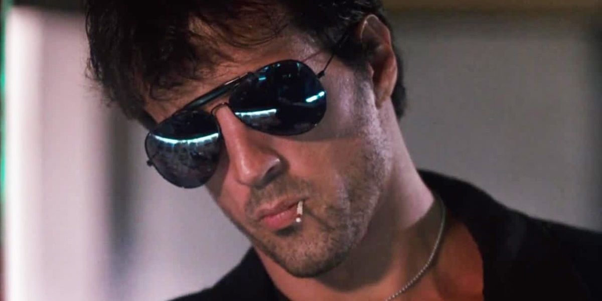 Sylvester_Stallone_chewing_a_matchstick_in_Cobra