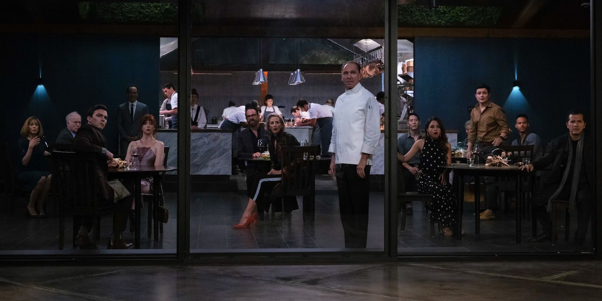 Chef Slowik and the guests look outside in The Menu