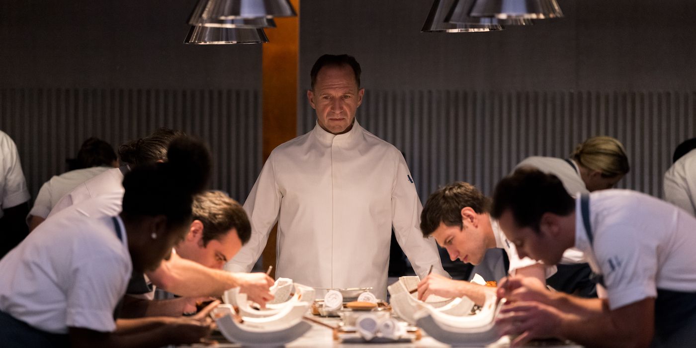Ralph Fiennes looks over his chefs in The Menu