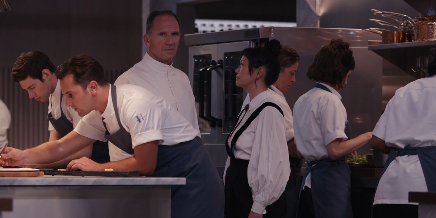 Chef Slowik conducts his chefs in the kitchen in The Menu