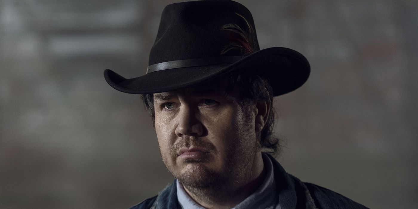 Eugene from The Walking Dead wearing a cowboy hat.