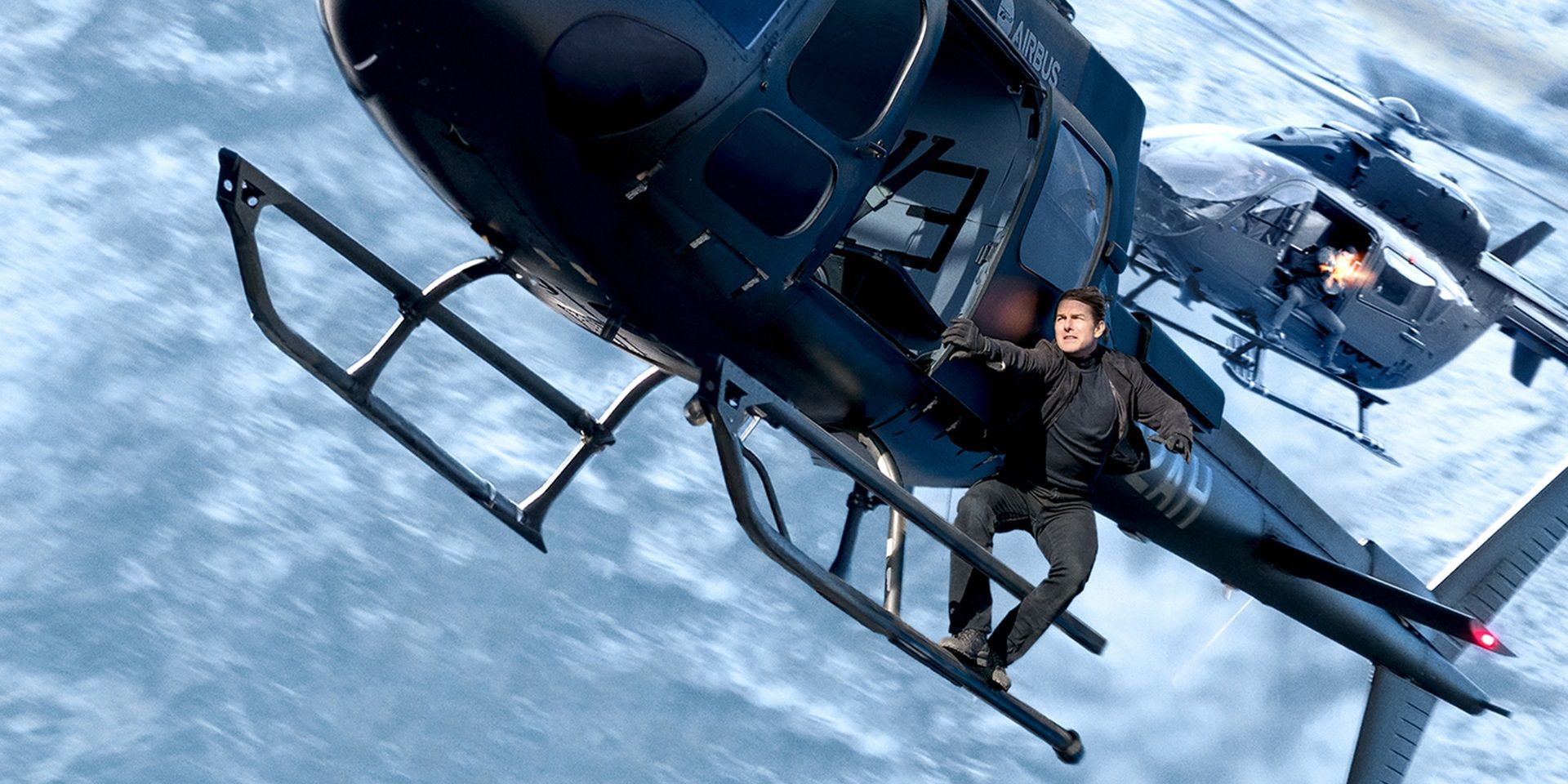 Tom Cruise hanging from a helicopter in Mission Impossible Fallout