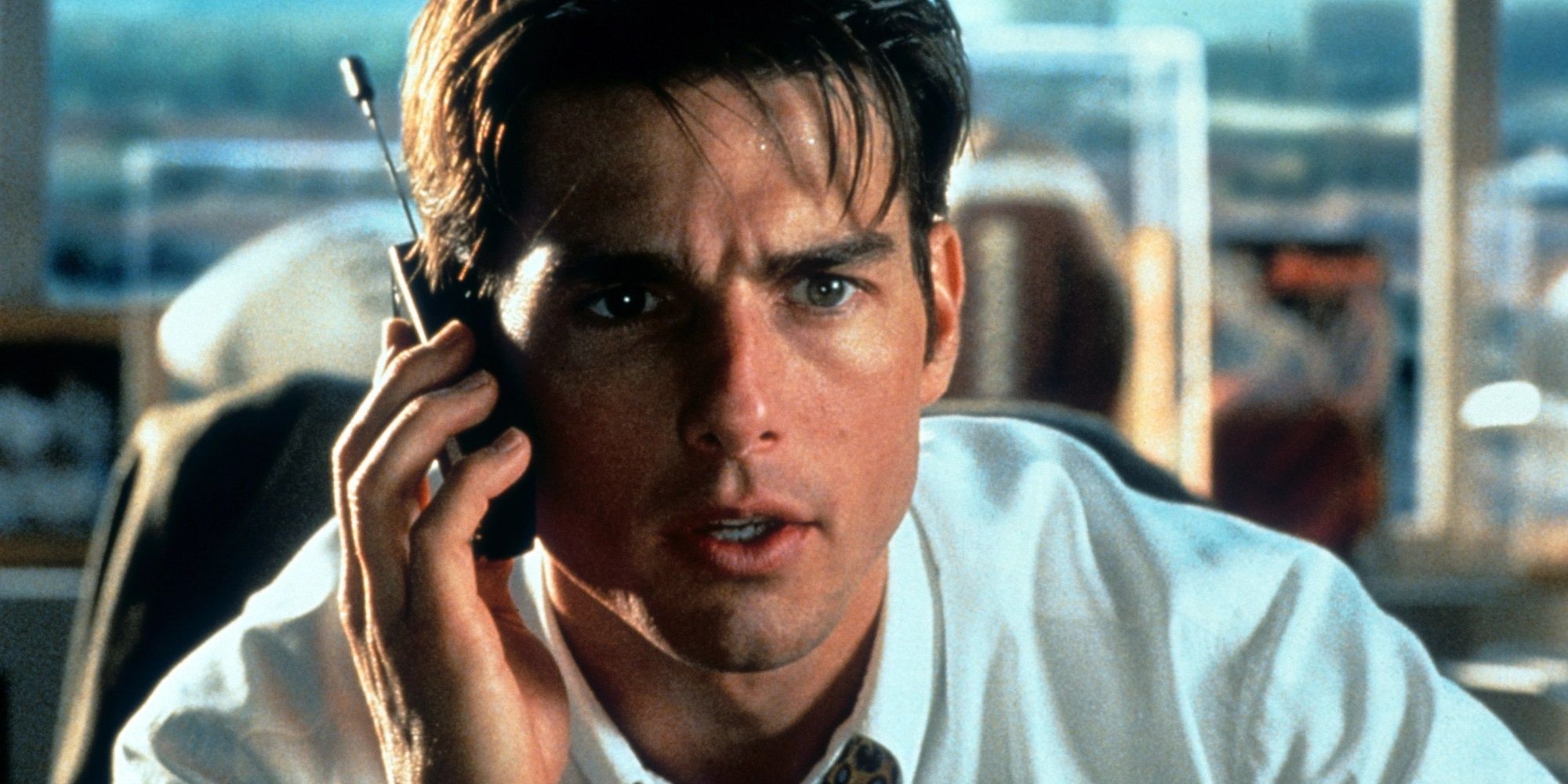 Tom Cruise speaks on the phone in Jerry Maguire.