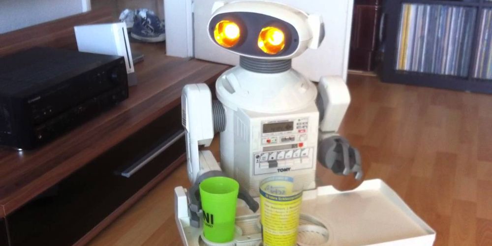 A Tomy Omnibot 2000 serves drinks