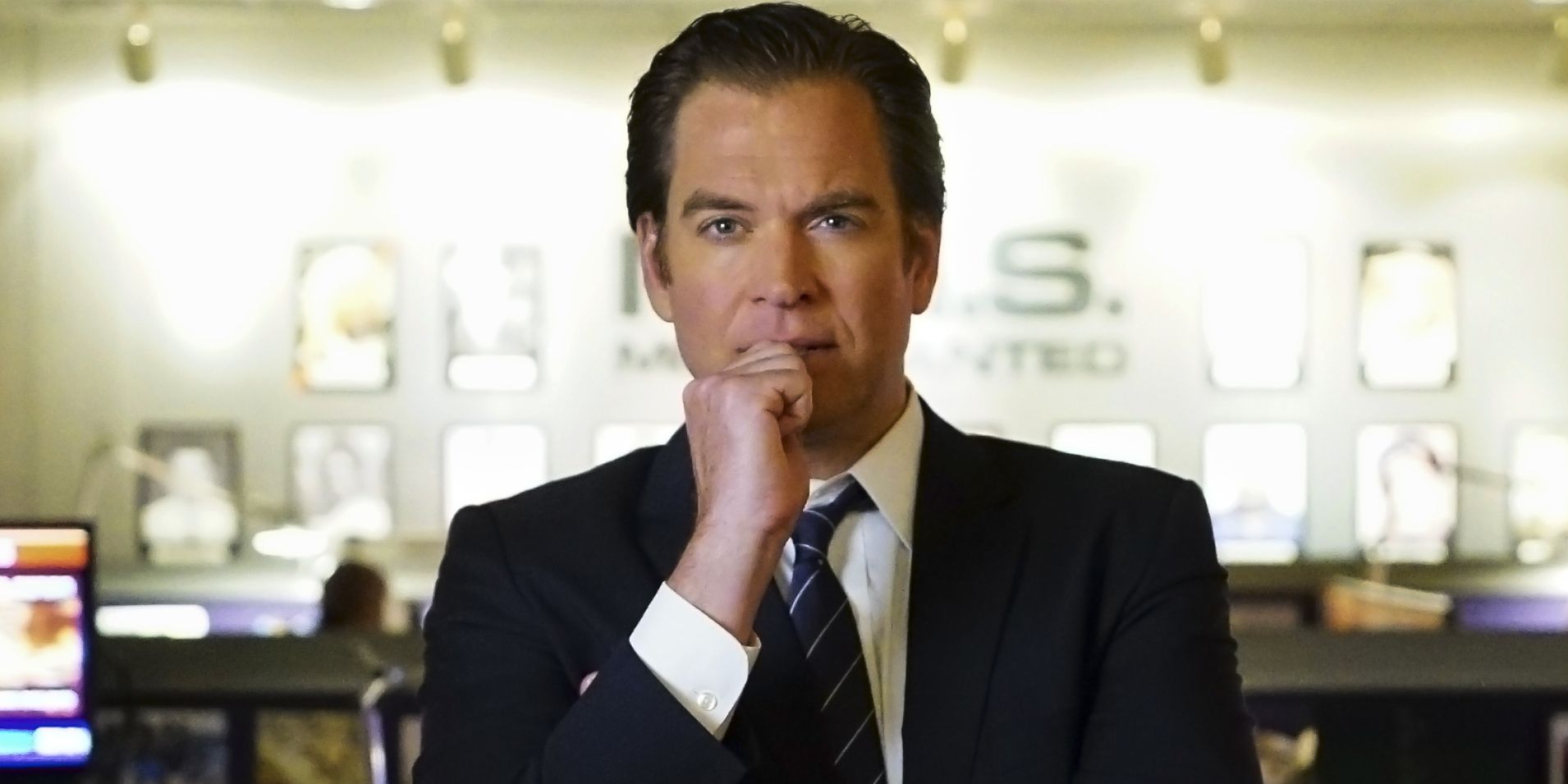 Tony DiNozzo thinking with his hand raised to his mouth in NCIS