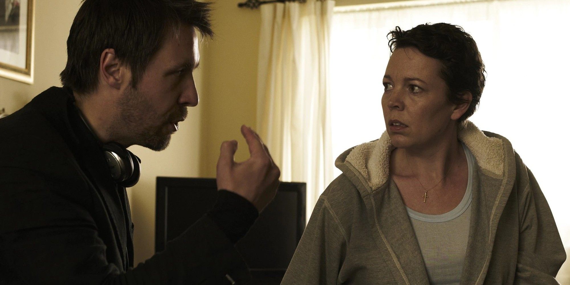 Olivia Colman talking to Paddy Considine in Tyrannosaur