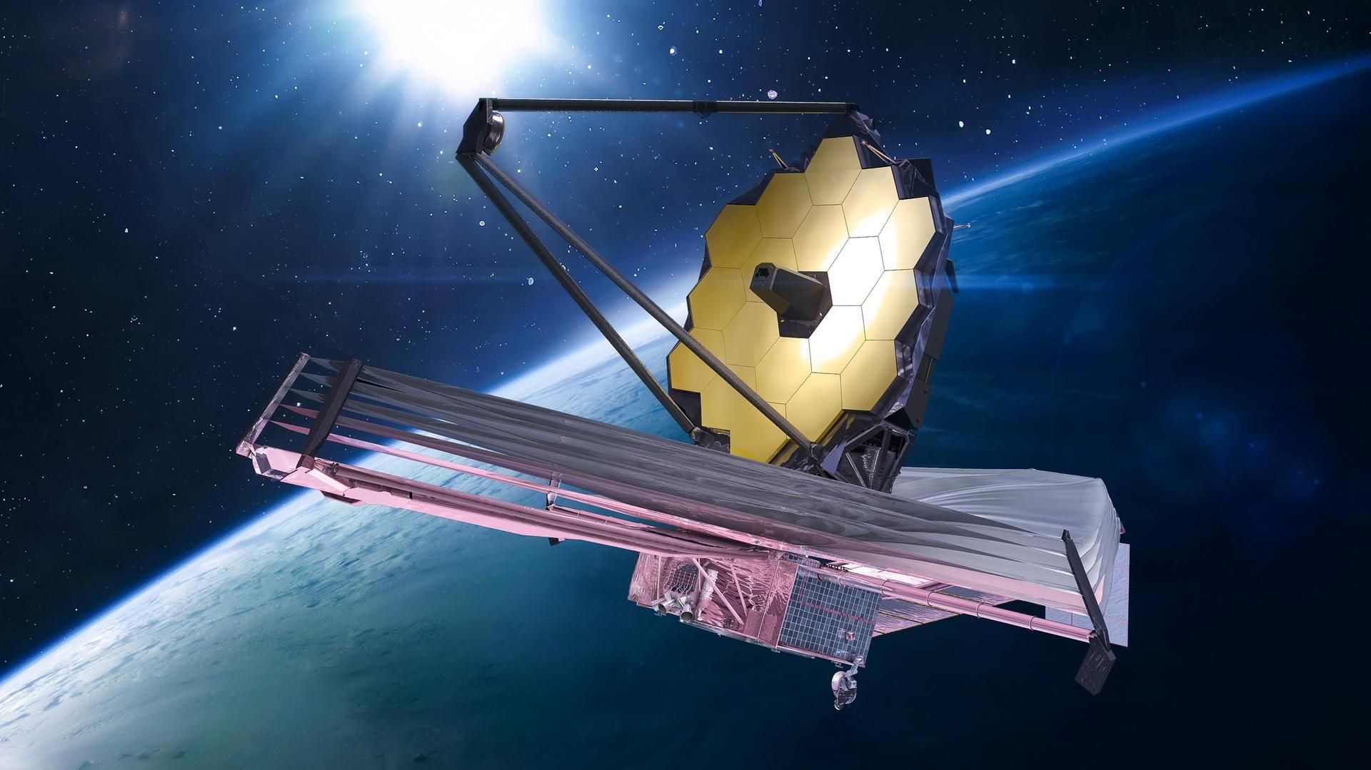 A render of the James Webb Space Telescope in space, with Earth in the background