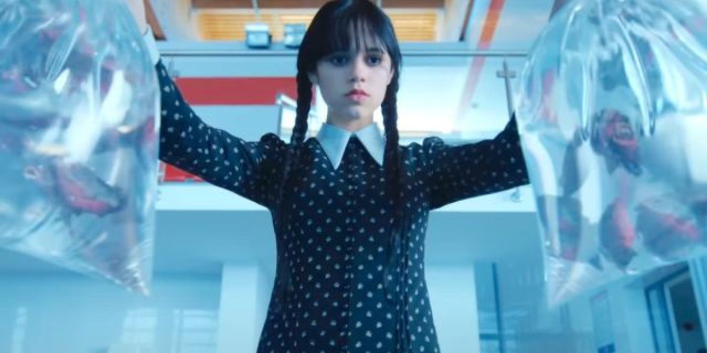 full body of a Wednesday Addams (Jenna Ortega) grinds the big axe