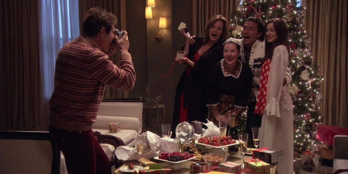 Blair and her family posing for a Christmas picture at dinner in Gossip Girl