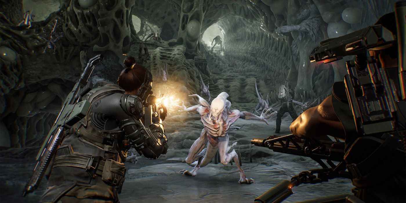 Player character shooting a Xenomorph in Aliens: Fireteam Elite