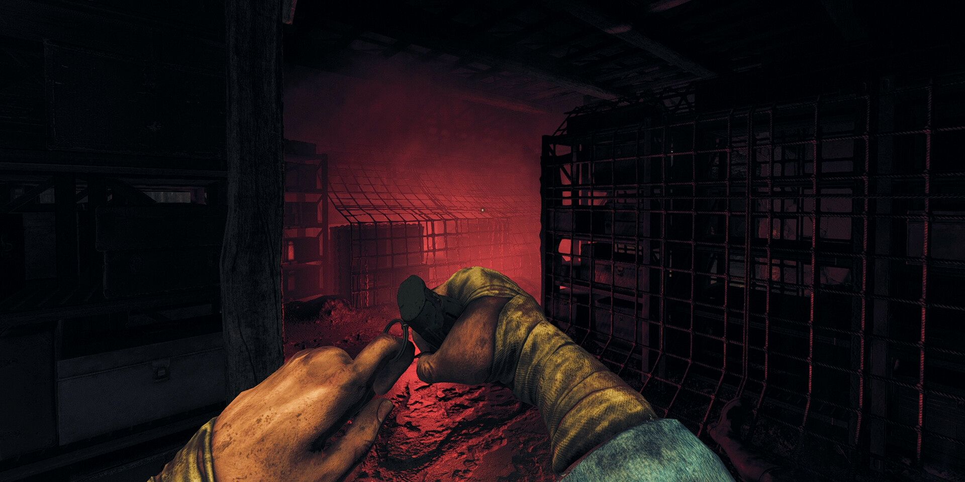 Amnesia: The Bunker&rsquo;s protagonist holding a grenade.